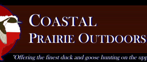 Vintage sign reading 'Coastal Prairie Outfitters' with a duck hunting slogan.