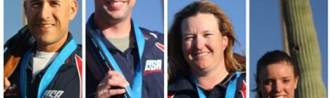 Four medalists with American flags and medals.