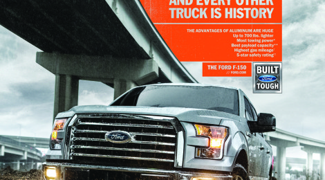 Ford F-150 driving off-road under a bridge with bold text.